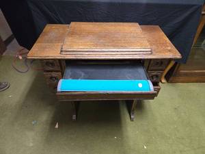 lot 5 image: Antique Oak Treadle Sewing Machine Cabinet with Carved Detailing Made Into Desk with Lighted Keyboard Tray - Early 20th Century