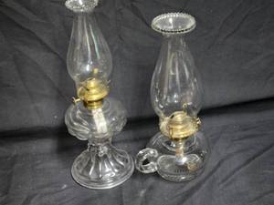 lot 23 image: Pair of Antique Clear Glass Oil Lamps with Brass Burners