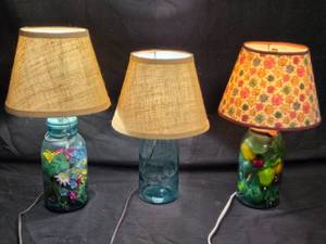 lot 27 image: Vintage Mason Jar Lamps with Floral and Fruit Arrangements - Set of 3