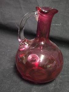 lot 143 image: Ruby Red Art Glass Pitcher with Clear Handle