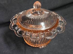 lot 148 image: Pink Depression Glass Lidded Candy Dish with Open Lace Edge