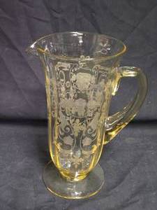 lot 194 image: Fostoria Minuet Pattern Yellow Glass Pitcher with Floral Etched Design