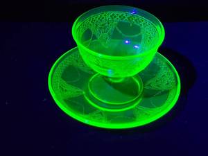 lot 249 image: Vintage Green Depression Uranium Glass Cup and Saucer Set
