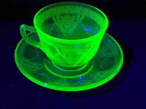 lot 253 image: Green Depression Uranium Glass Teacup and Saucer