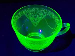 lot 256 image: Green Depression Uranium Glass Coffee Mug