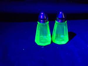 lot 263 image: Vintage Uranium Glass Salt and Pepper Shakers with Metal Lids
