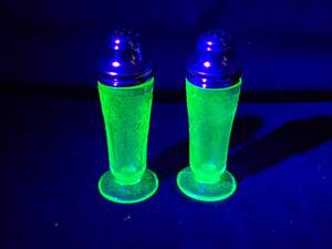 lot 265 image: Green Uranium Glass Salt and Pepper Shakers with Floral Design and Metal Lids