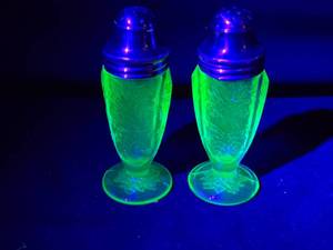 lot 267 image: Vintage Green Uranium Glass Salt and Pepper Shakers with Floral Motif and Metal Lids