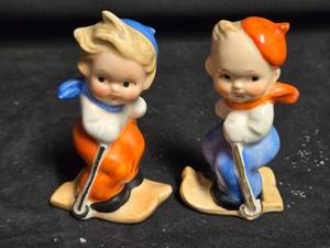 lot 311 image: Vintage Skier Boy and Girl Salt and Pepper Shakers