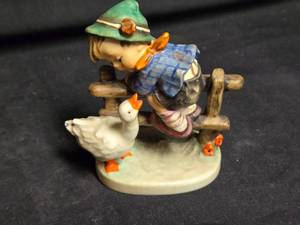 lot 336 image: Goebel Hummel Style Figurine - Boy on Fence with Goose