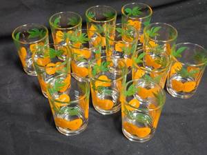 lot 341 image: Set of 13 Vintage Juice Glasses with Orange and Green Leaf Design