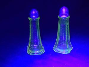 lot 276 image: Uranium Glass Salt and Pepper Shakers with Octagonal Bases and Metal Lids