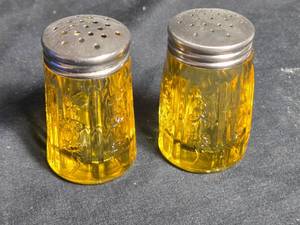 lot 295 image: Pair of Amber Glass Salt and Pepper Shakers with Metal Lids