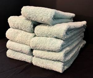 lot 84 image: Plush Rugs, Towels and Washcloths