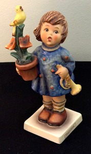 lot 251 image: Eight Collectible Hummel Figurines