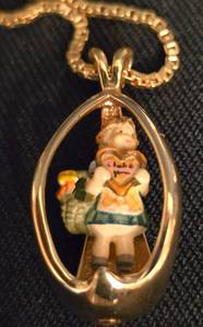 lot 299 image: Hummel 18K Gold Over Sterling Pendant  Hummel Figures