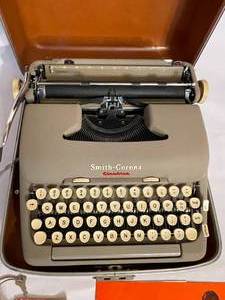 lot 399 image: Vintage Smith-Corona Electric Typewriter with Case