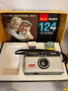 lot 435 image: Vintage Kodak and Polaroid Cameras with Accessories