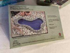 lot 464 image: Fairy Garden Accessories New in the Box Includes Pond, Enchanted Door and Striped Gourd House