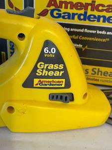 lot 489 image: American Gardner Six Volt Rechargeable Four Inch Grass Sheer