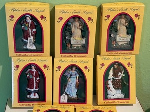 lot 179A image: Eight Pipkas Earth Angel Christmas Ornaments including Pipkas Earth Angel Miracle of Snow Angel Ornament