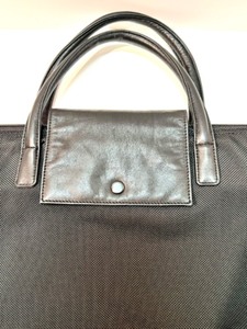 lot 98 image: TUMI Black Canvas Bag