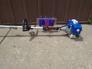 Badger gas weed trimmer. Looks lightly used. Tested & works. As shown.
