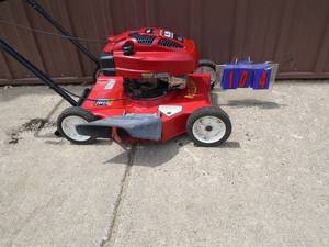 Rallye push mower with 6.75 craftsman motor. Nice condition. Tested & works. As shown.