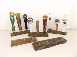 lot 14 image: Lot of 9 Beer Tappers On Displays wExtra Display Stands
