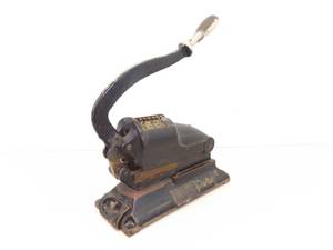 lot 45 image: Antique Cummins Cast Iron Perforator