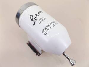 lot 86 image: Vintage LURON Porcelain Dry Soap Dispenser