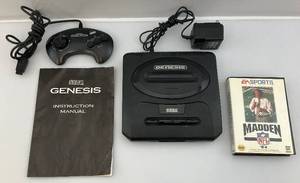 lot 40 image: Vintage SEGA GENESiS Game System With One Controller, Madden 94 & Manual