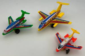lot 58 image: Misc. Tin Litho And Plastic Friction Airplanes