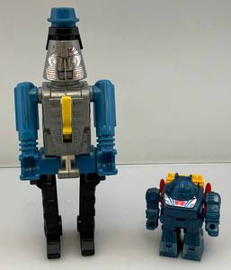 lot 73 image: 1984 Go-Bots  (Rogun) Transforms To Cap Gun & Miniature Robot