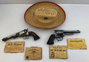 lot 100 image: Vintage U.S. Dragoon, Colt Peace Maker (Aged) Cap Guns & More