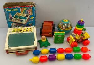 lot 102 image: Misc. Vintage Fisher Price Toys & More