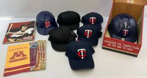 lot 184 image: Misc. Vintage Twins Hard Hat, Dairy Queen Snapbacks & More