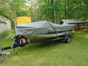 1997 Lowe Roughneck 176 Boat with 115 HP Evinrude and 1997 Midi Shorelander Trailer