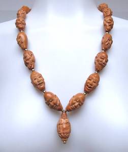 lot 33 image: Excellent Vintage Hand Carved Oriental Olive Nut Lohan Buddha Head Necklace