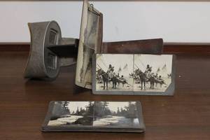 lot 42 image: Sun Sculpture U & U Antique Stereoviewer with 7 Cards