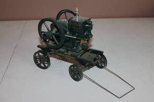 lot 113 image: Ertl McCormick-Deering  Die-Cast Model Hit and Miss Engine On Wheeled Cart