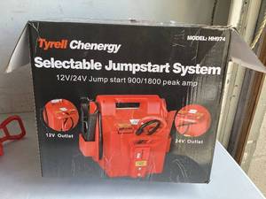 lot 506 image: Tyrell Chenergy 12V24V Car Jump Starter 1800 Amp, Heavy Duty Automotive Battery Booster Jumper Box with USB DC Power Unit