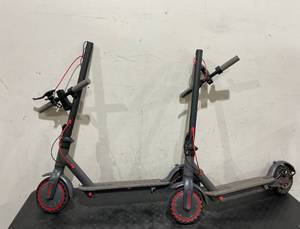 lot 33 image: LOT OF 2 Electric Scooters. They both turn on and move.