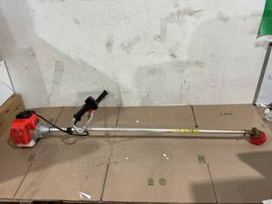 lot 95 image: 18.5 Cutting Path 4-in-1 Gas Weed Eater - Powerful Brush Cutter