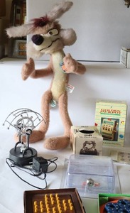 lot 205 image: Collectible Vintage Toys Warner Bros. Plush 24-Inch Willie E. Coyote 1970s, Golden Jackpot Toy Slot Machine Etc