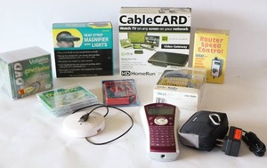 lot 218 image: HD HomeRun Cable Card Video Gateway, DVD-RW Verbatim Pack, Brother P-Touch  Printer, Head Strap Magnifier wLights, Wireless Smoke Detector Spy Camera Etc