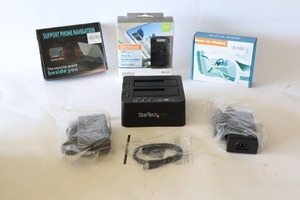 lot 243 image: Dual Bay Hard Drive Duplicator Standalone USB 3.0 (5 Gbps), IOGEAR Solar Bluetooth Hands-Free Car Kit NIB, HeadUp Display Etc