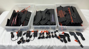 lot 62 image: Large Lot of Aurora Tommy Race Tracks and Controllers
