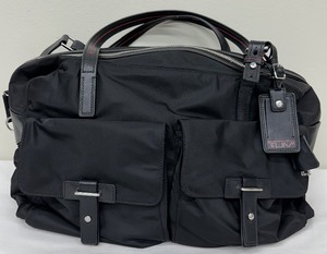 lot 83A image: Tumi 16 Black Ballistic Nylon and Leather Cortina Boarding Bag