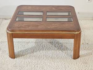 lot 21 image: Mid Mod Glass Insert Cocktail Table Featuring Burlwood Surface